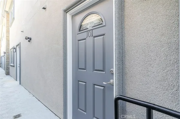 a view of a entryway with wooden floor