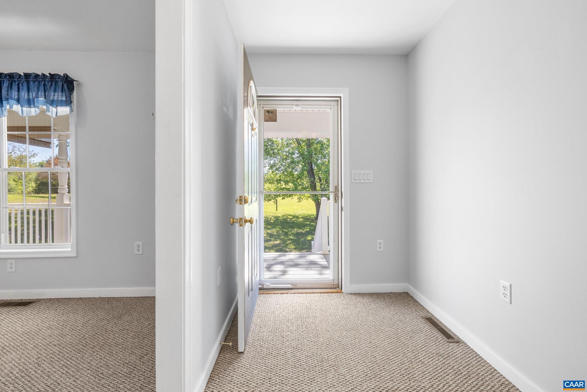 1075 Social Hall Road New Canton, VA 23123 - Photo 3 of 64 a view of an empty room with a window
