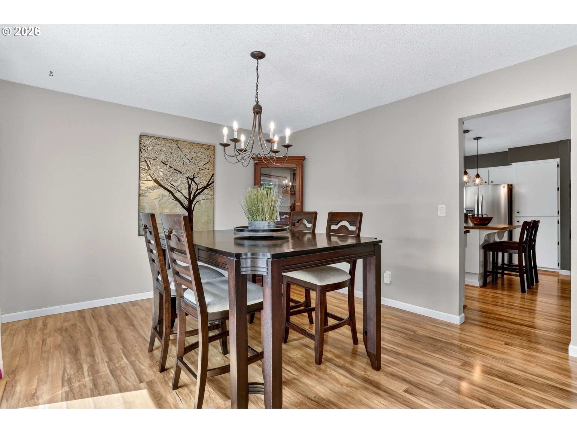 1776 Southeast 114th Place Portland, OR 97216 - Photo 27 of 47 a view of a dining room with furniture and wooden floor