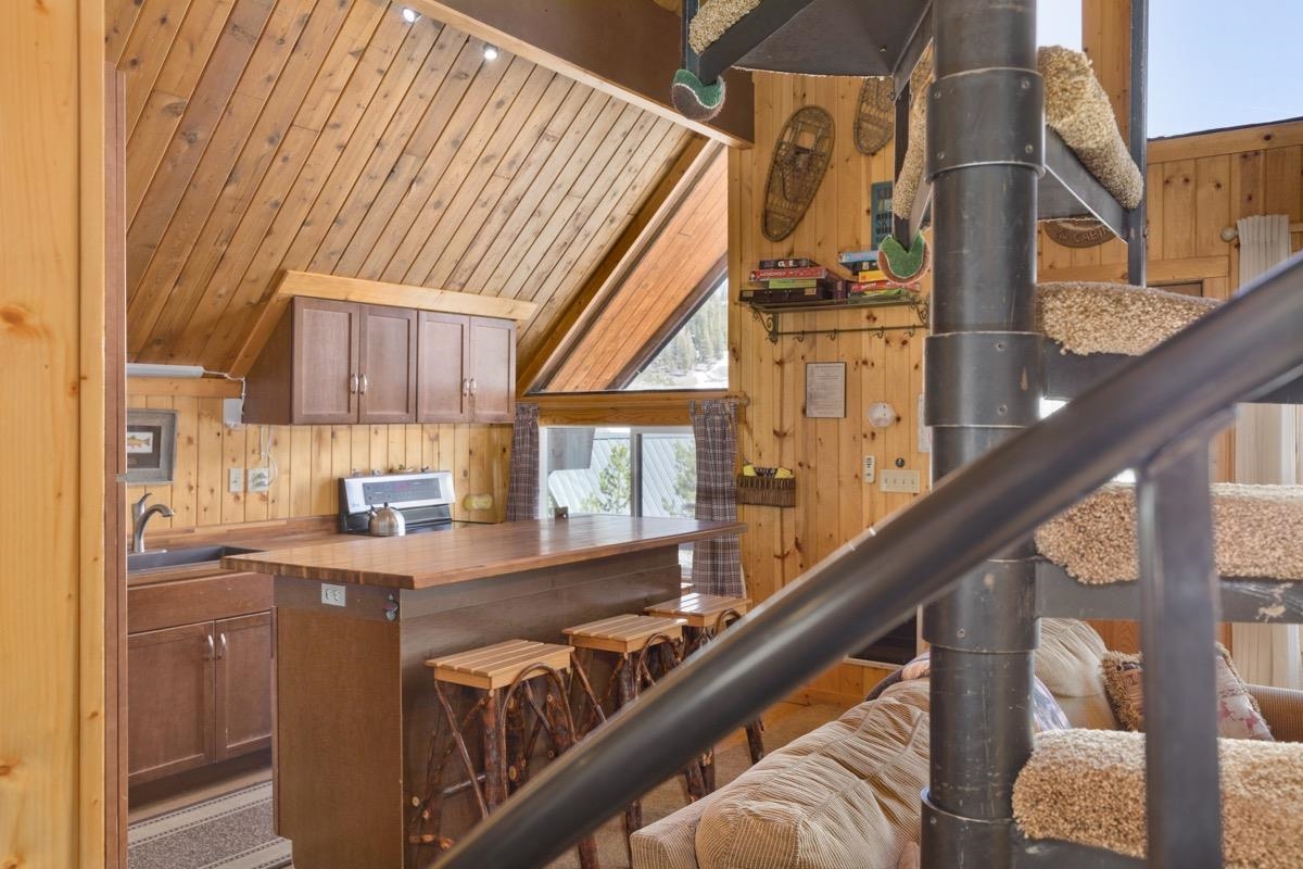 11000 Minaret Road, Unit 2 Mammoth Lakes, CA 93546 - Photo 24 of 31 a view of a kitchen with furniture and windows