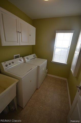 27458 Cromwell Road Novi, MI 48374 - Photo 17 of 39 2nd level laundry room with washer and dryer included.