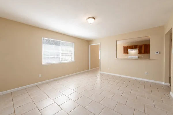 an empty room with windows