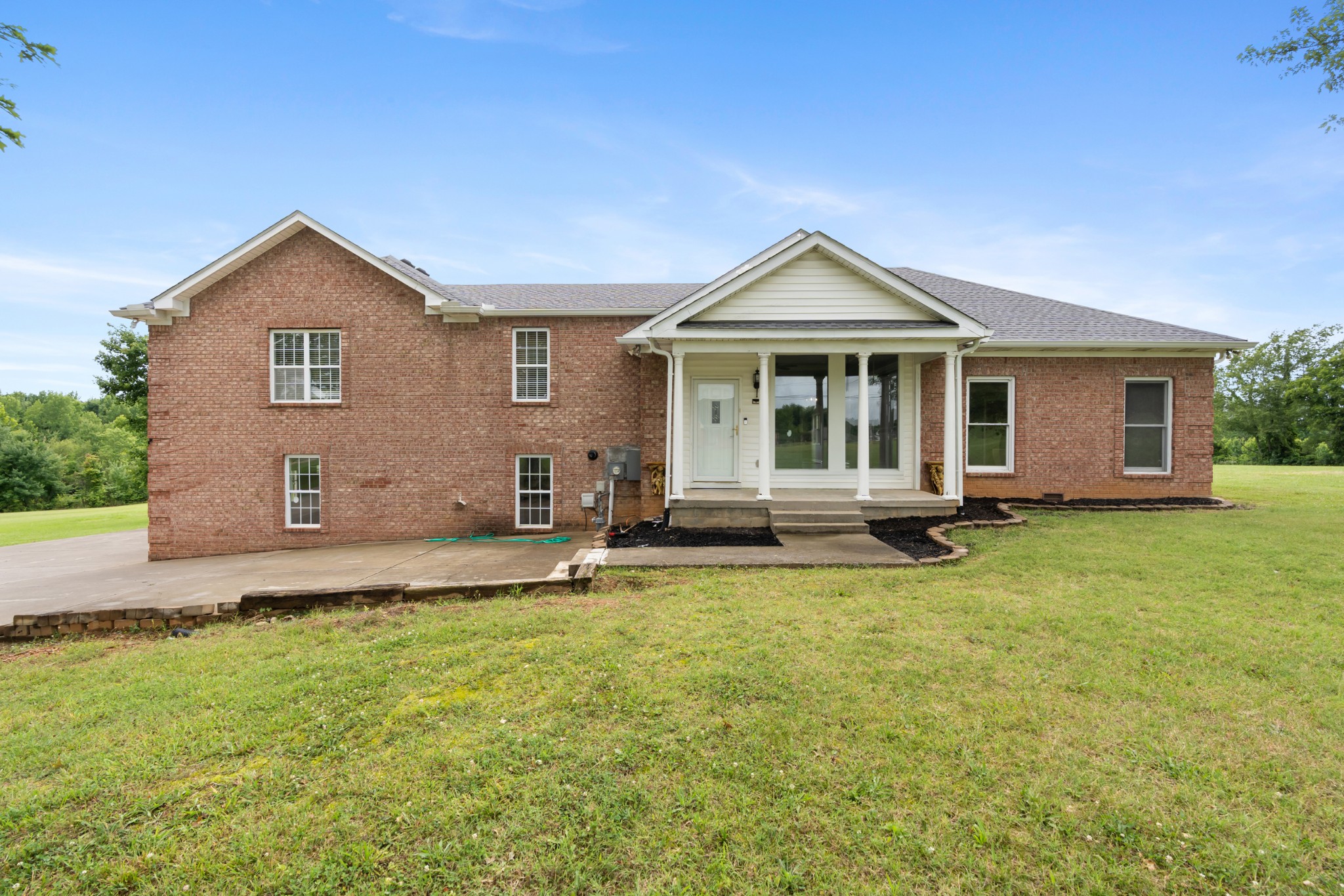 4602 Washington Road Springfield, TN 37172 - Photo 55 of 63 a front view of a house with a garden and yard