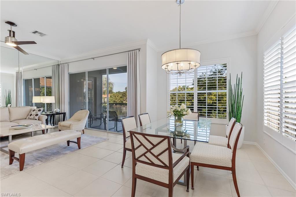 1211 Egrets Landing, Unit 202 Naples, FL 34108 - Photo 11 of 26 Stylish Lighting, Plantation Shutters