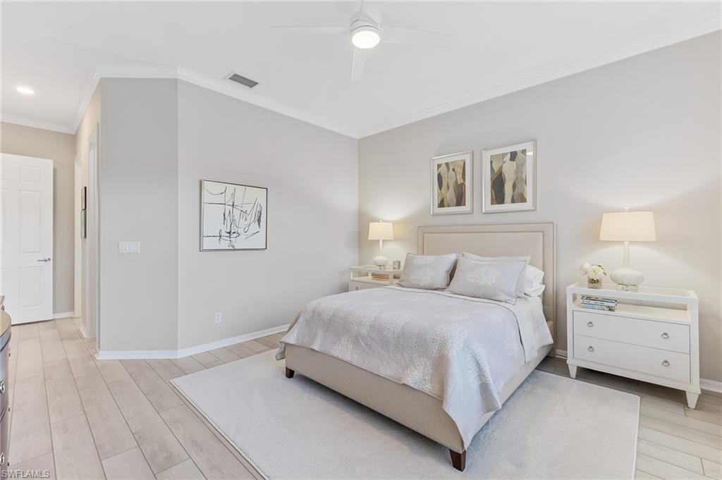 1211 Egrets Landing, Unit 202 Naples, FL 34108 - Photo 13 of 26 Wood Look Flooring, Crown Molding