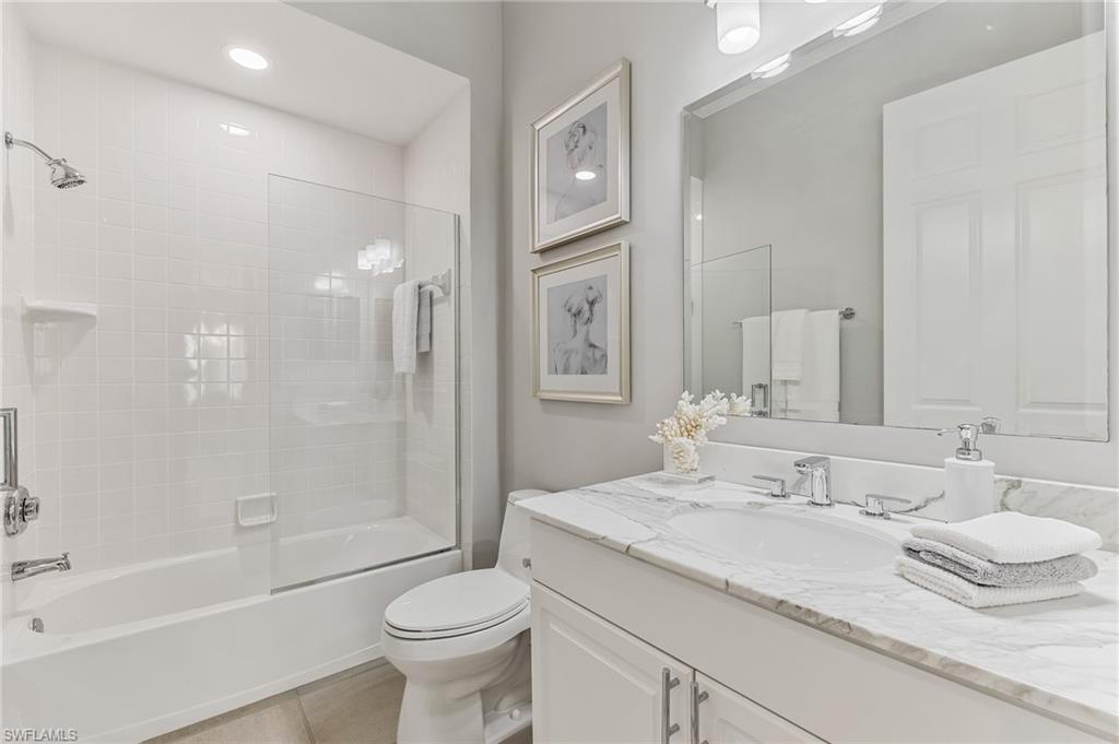 1211 Egrets Landing, Unit 202 Naples, FL 34108 - Photo 17 of 26 Updated Guest Bath