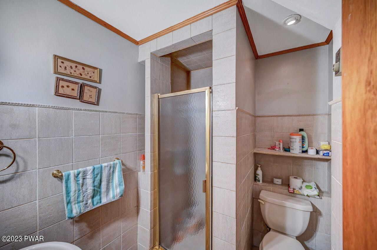 20 Wash Road Waymart, PA 18472 - Photo 17 of 49 a bathroom with a toilet and a shower
