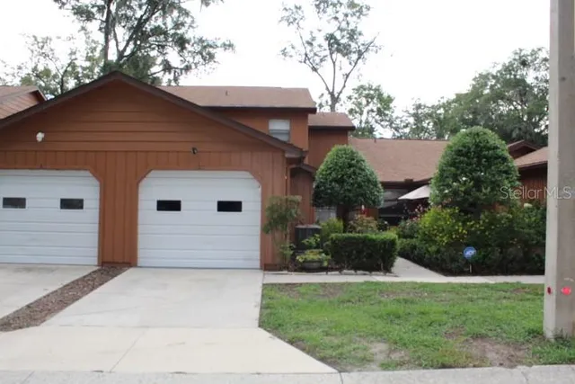 a front view of house with a yard