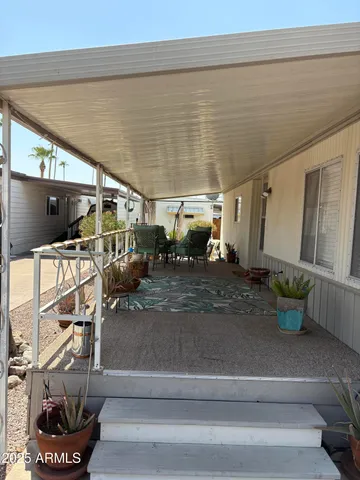 a view of a living room and entry way