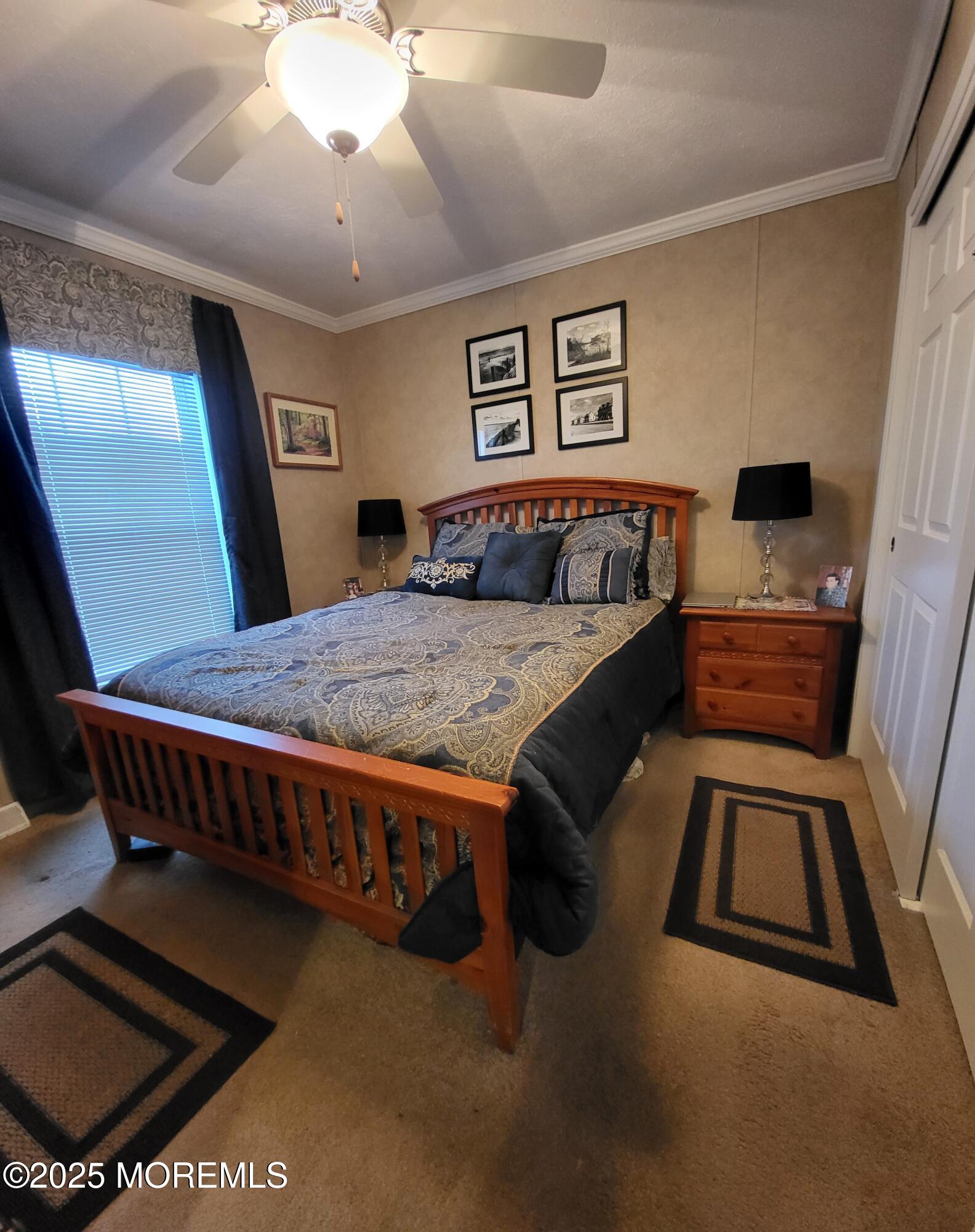 9 Shorehaven Road Hazlet, NJ 07730 - Photo 12 of 20 a bed room with a bed and a dresser