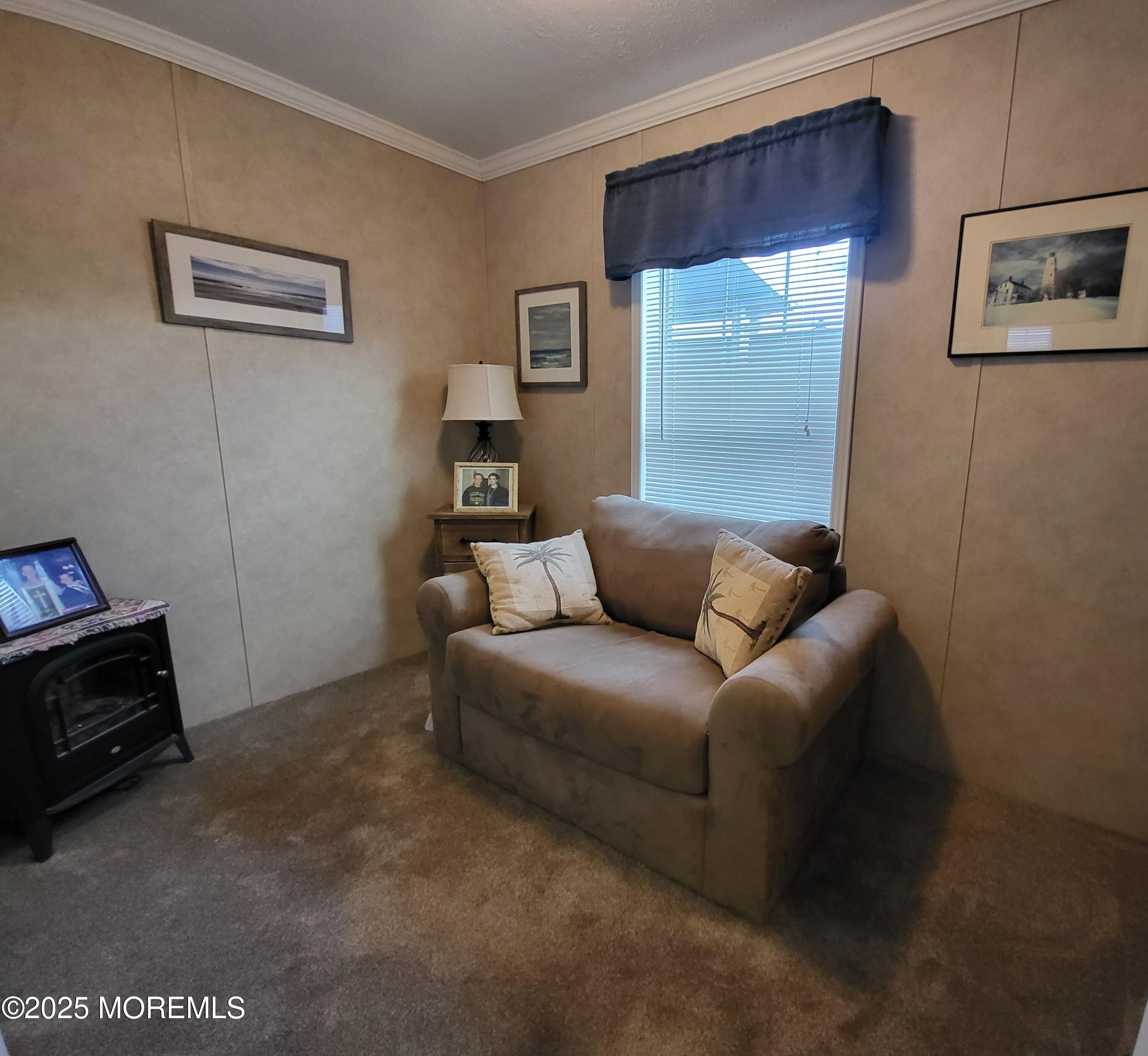 9 Shorehaven Road Hazlet, NJ 07730 - Photo 14 of 20 a living room with furniture and a window