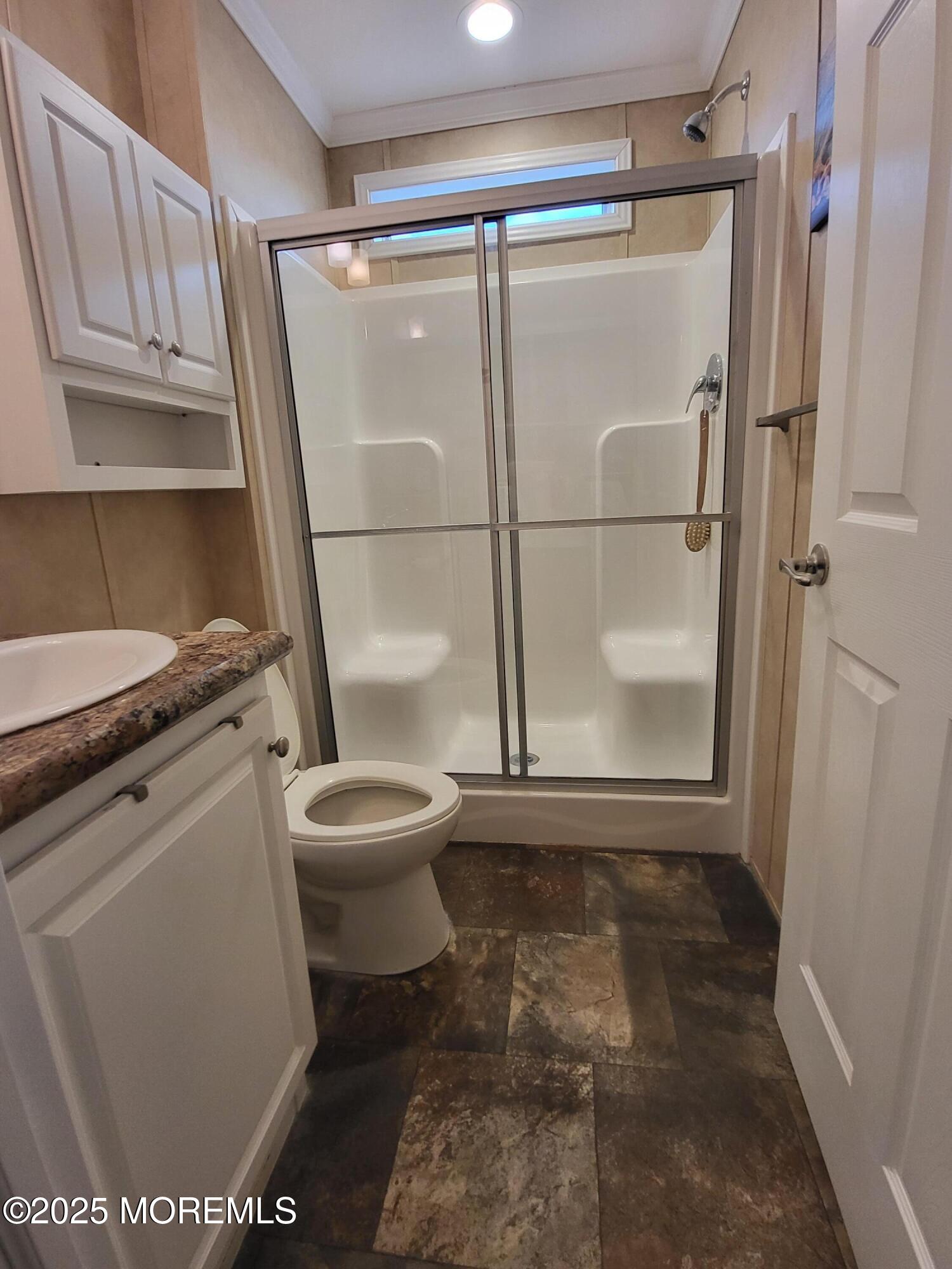 9 Shorehaven Road Hazlet, NJ 07730 - Photo 15 of 20 a bathroom with a toilet and a shower