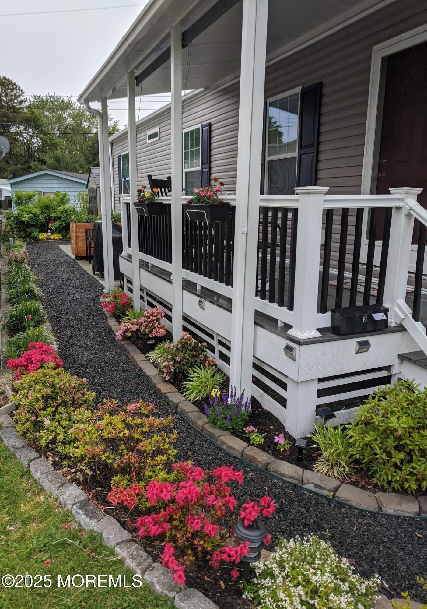 9 Shorehaven Road Hazlet, NJ 07730 - Photo 17 of 20 a view of a house with a wooden fence