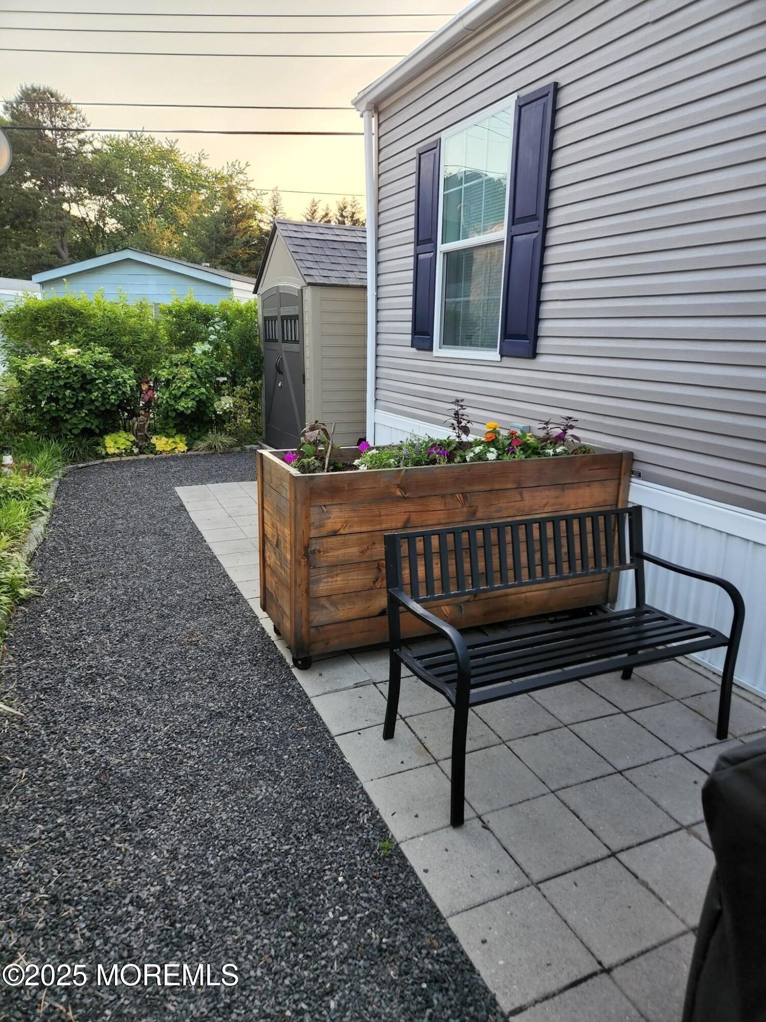 9 Shorehaven Road Hazlet, NJ 07730 - Photo 18 of 20 a view of a house with backyard and sitting area