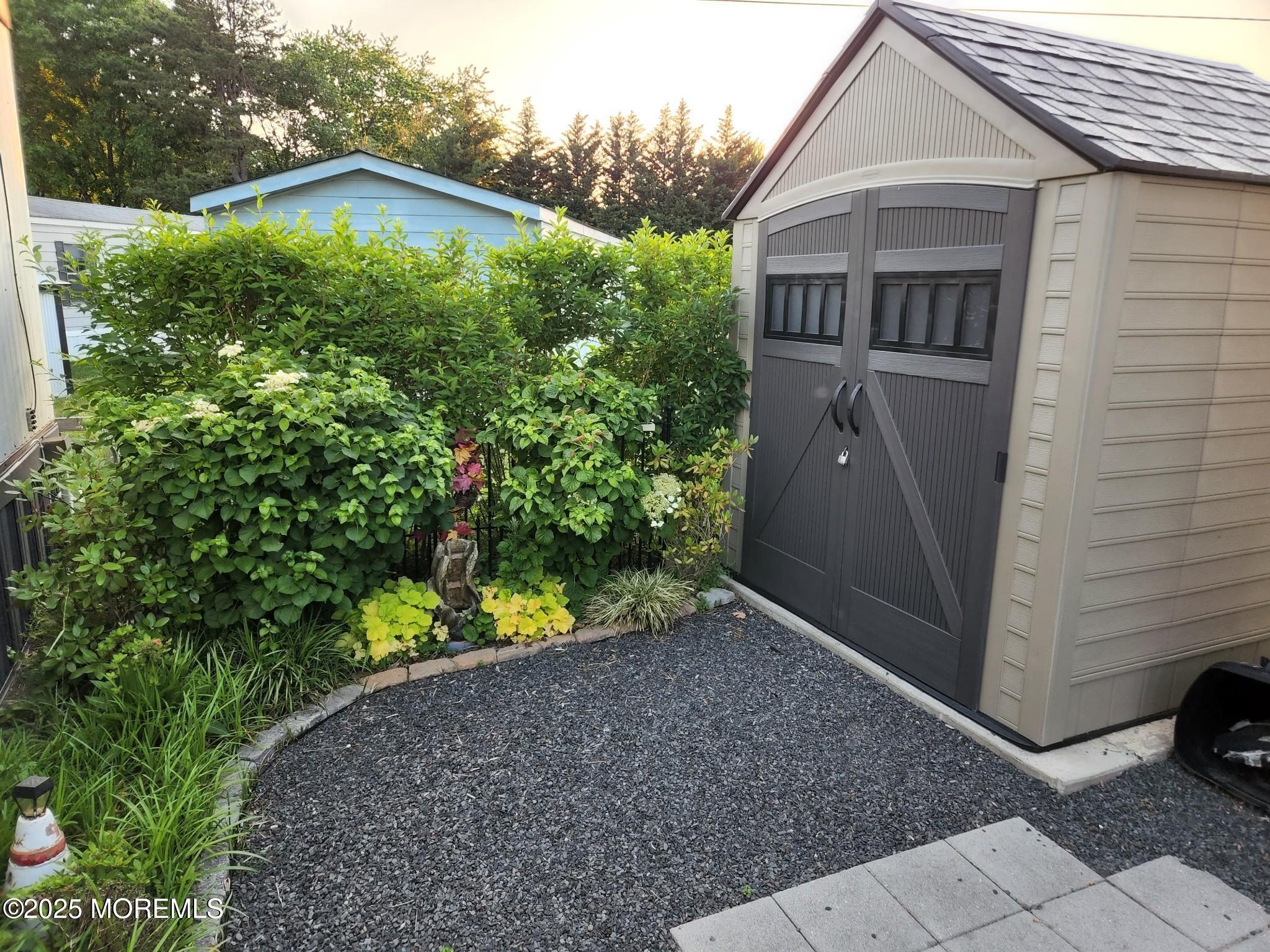 9 Shorehaven Road Hazlet, NJ 07730 - Photo 20 of 20 a front view of a house with a yard