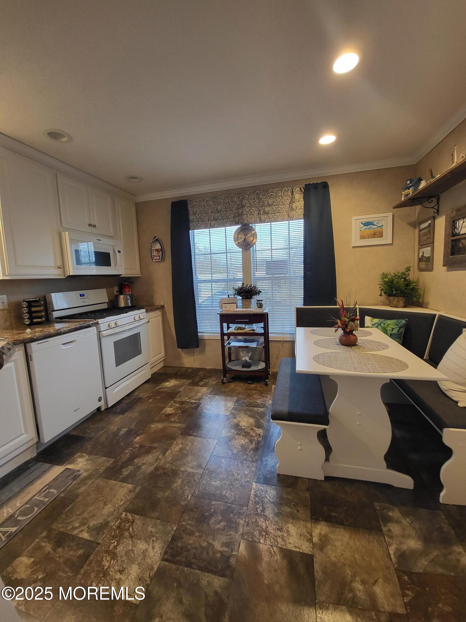 9 Shorehaven Road Hazlet, NJ 07730 - Photo 6 of 20 a kitchen with a sink and a stove top oven