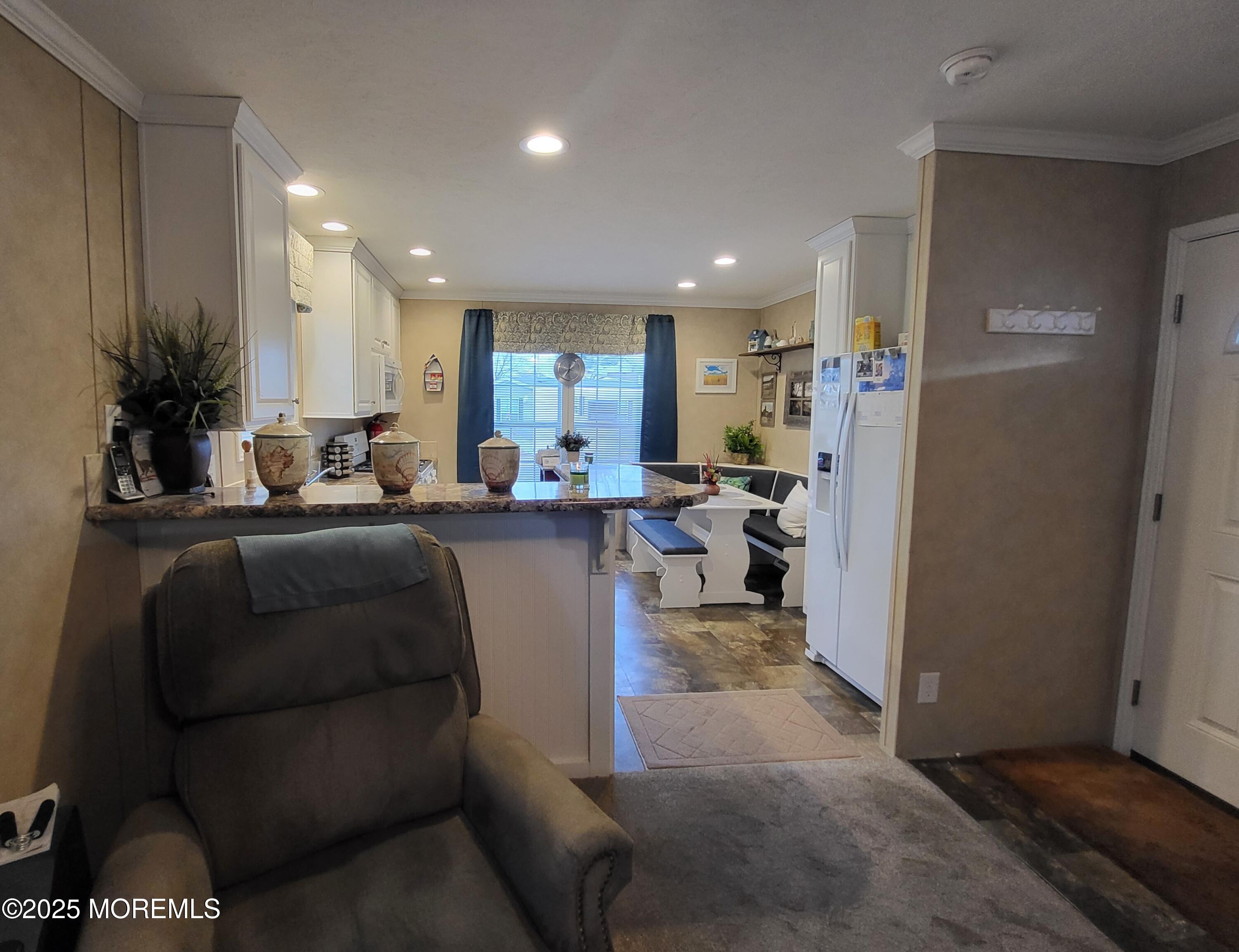9 Shorehaven Road Hazlet, NJ 07730 - Photo 8 of 20 a living room with furniture and a wooden floor