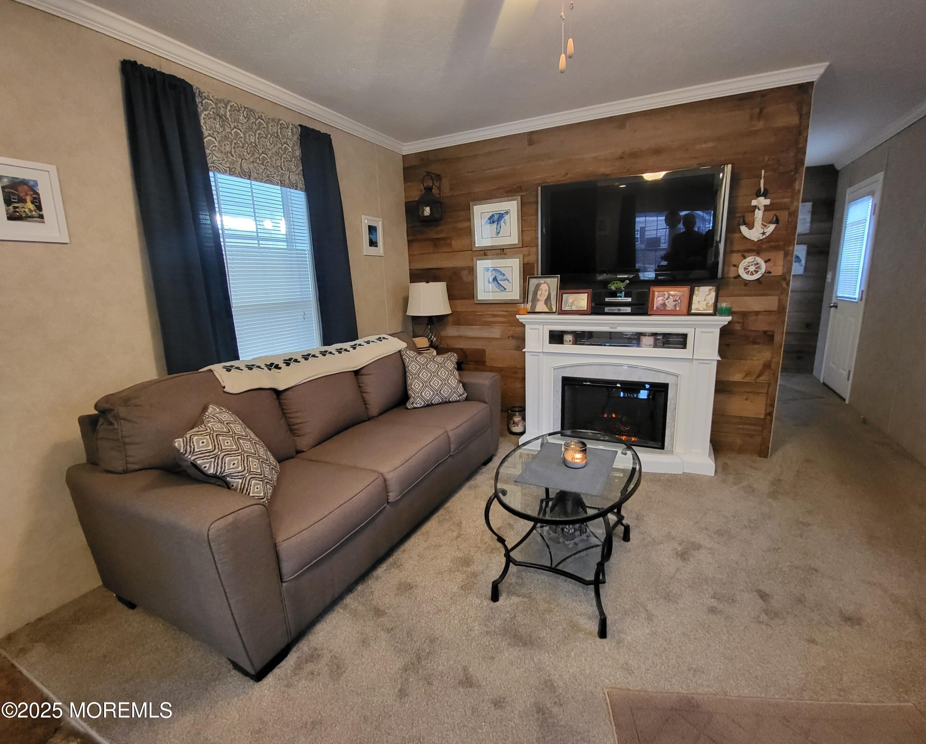 9 Shorehaven Road Hazlet, NJ 07730 - Photo 9 of 20 a living room with furniture and a flat screen tv