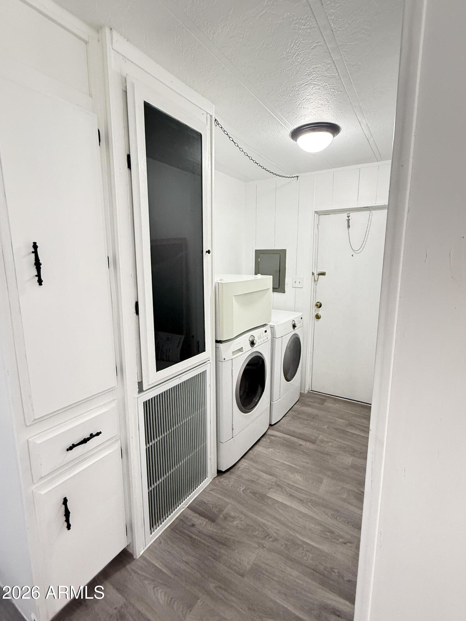 535 South Alma School Road, Unit 113 Mesa, AZ 85210 - Photo 14 of 41 a utility room with dryer and washer