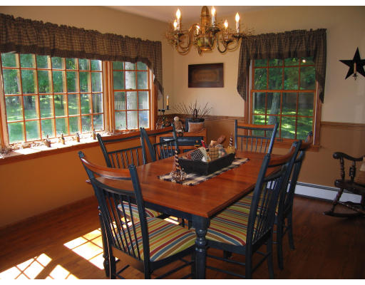 132 Upper Hampden Road Monson, MA 01057 - Photo 4 of 14 a dining room with furniture window and wooden floor
