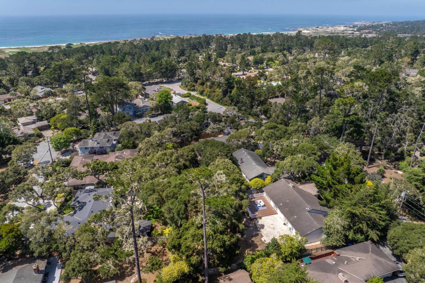 1044 Lost Barranca Road Pebble Beach, CA 93953 - Photo 15 of 15 an aerial view of a house with a yard