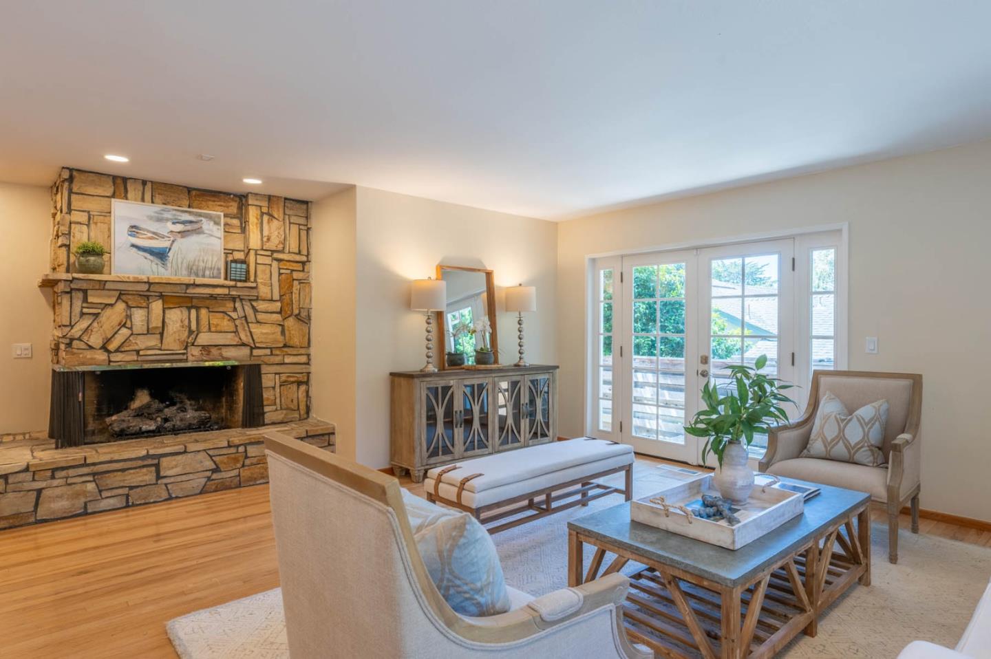 1044 Lost Barranca Road Pebble Beach, CA 93953 - Photo 2 of 15 a living room with furniture and a fireplace