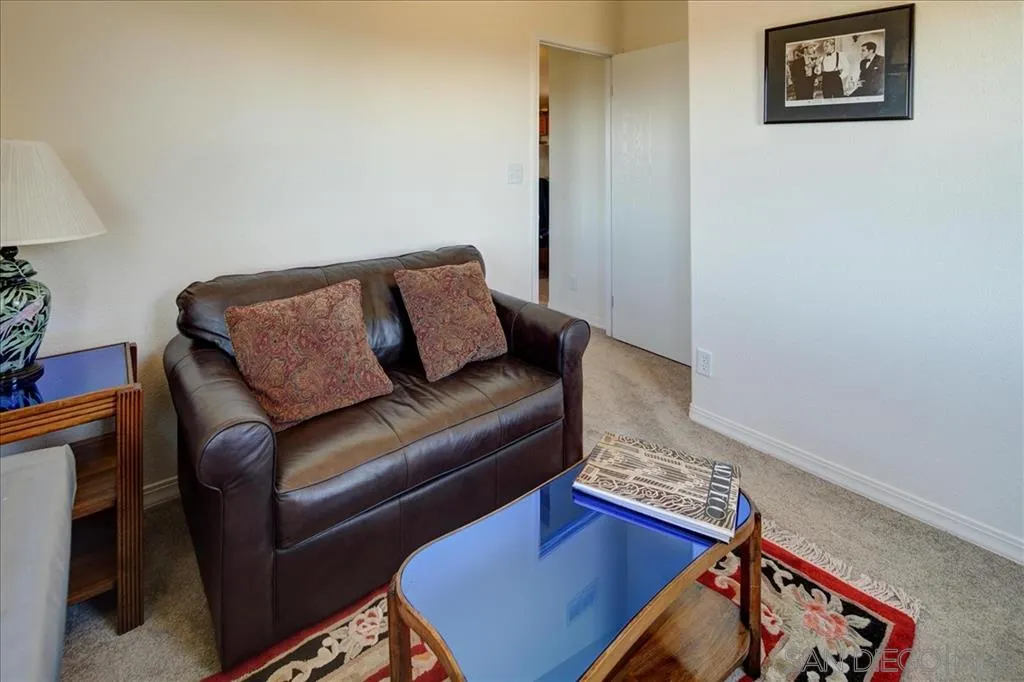 5495 Acorn Patch Road Julian, CA 92036 - Photo 15 of 23 a living room with furniture and a wooden floor