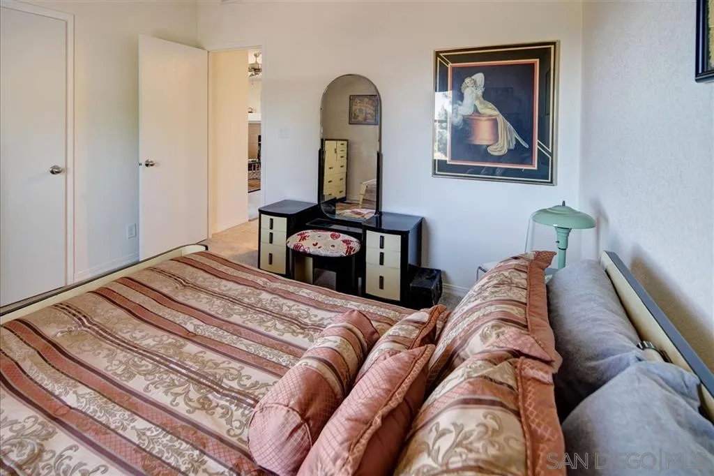 5495 Acorn Patch Road Julian, CA 92036 - Photo 17 of 23 a bedroom with a bed and a painting on the wall
