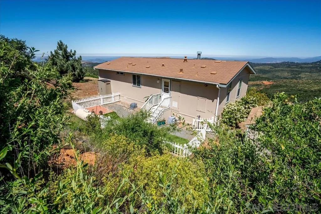 5495 Acorn Patch Road Julian, CA 92036 - Photo 5 of 23 an aerial view of a house with a yard