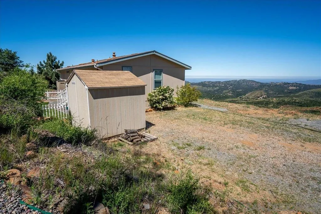 5495 Acorn Patch Road Julian, CA 92036 - Photo 6 of 23 a view of a house with a outdoor space