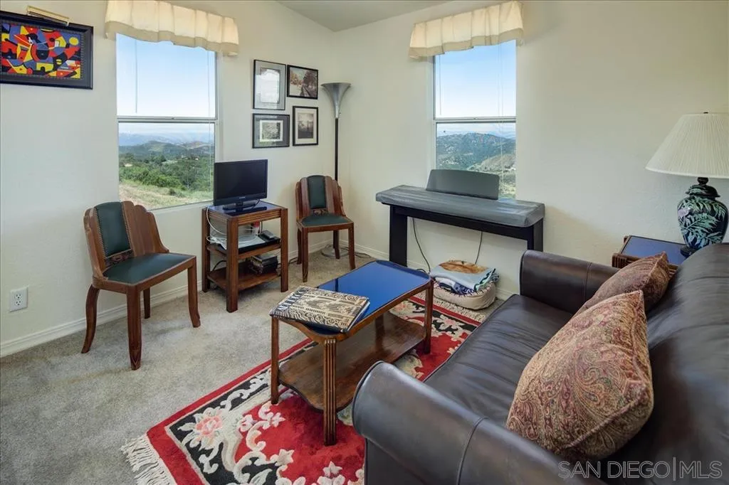 5495 Acorn Patch Road Julian, CA 92036 - Photo 9 of 23 a living room with furniture and a window