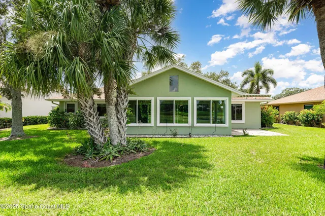 a house view with a garden space