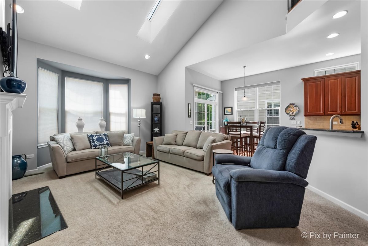 3879 Seigle Drive Elgin, IL 60124 - Photo 12 of 44 a living room with furniture and a large window