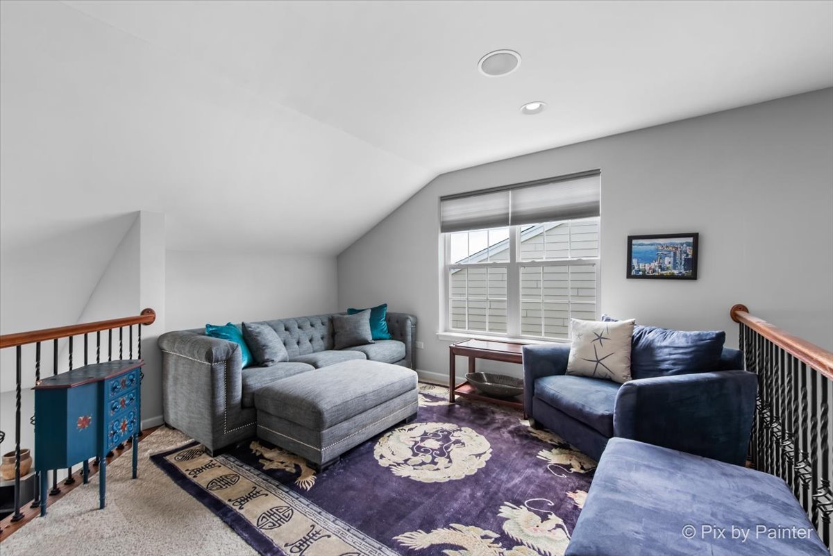 3879 Seigle Drive Elgin, IL 60124 - Photo 22 of 44 a living room with furniture rug and window