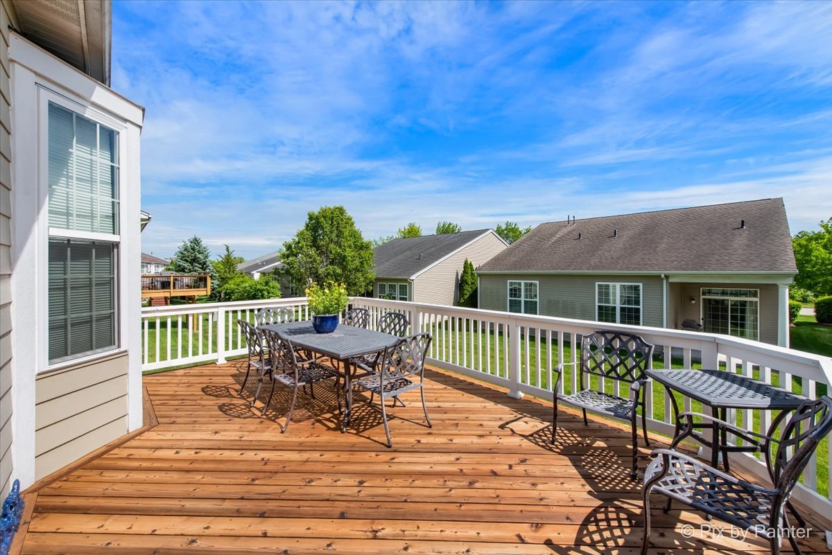 3879 Seigle Drive Elgin, IL 60124 - Photo 29 of 44 a view of a house with wooden deck