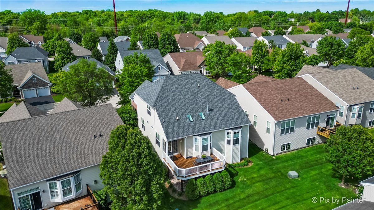 3879 Seigle Drive Elgin, IL 60124 - Photo 37 of 44 an aerial view of a house with a garden view