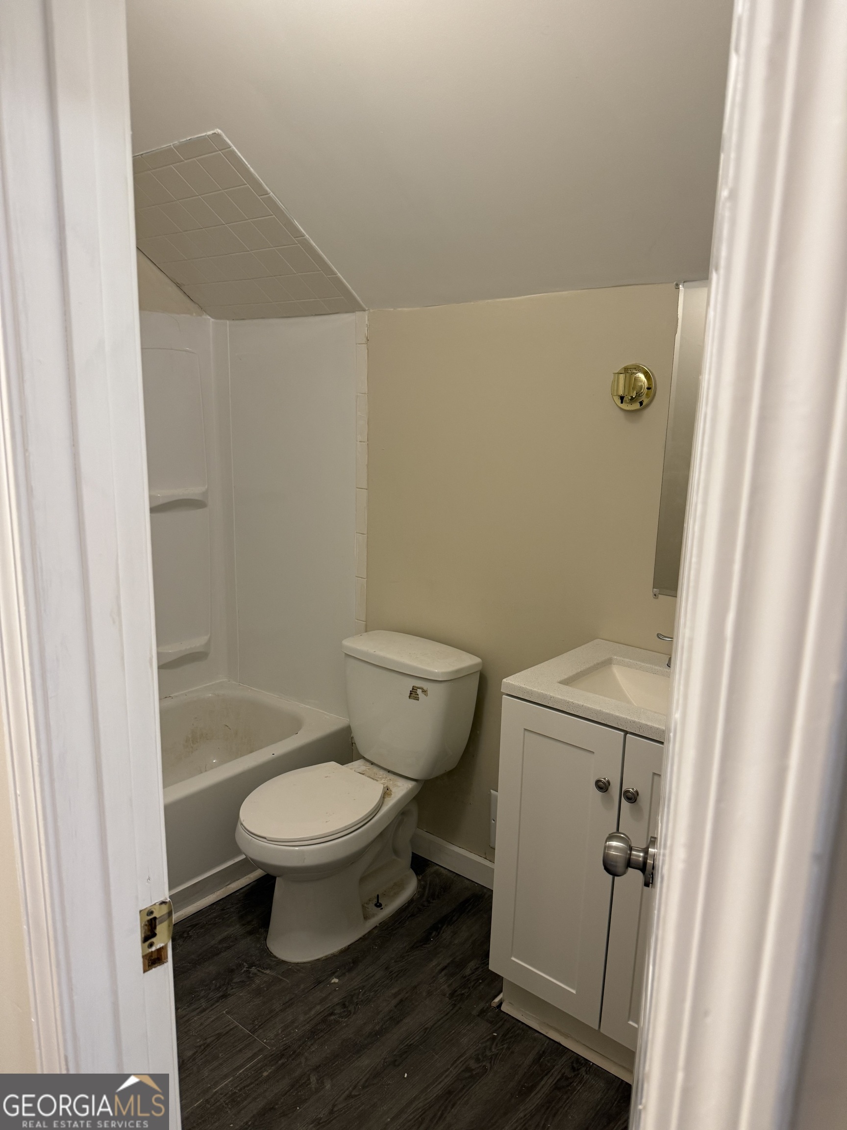 888 Timbercrest Court Lithonia, GA 30058 - Photo 10 of 13 a bathroom with a toilet and a shower