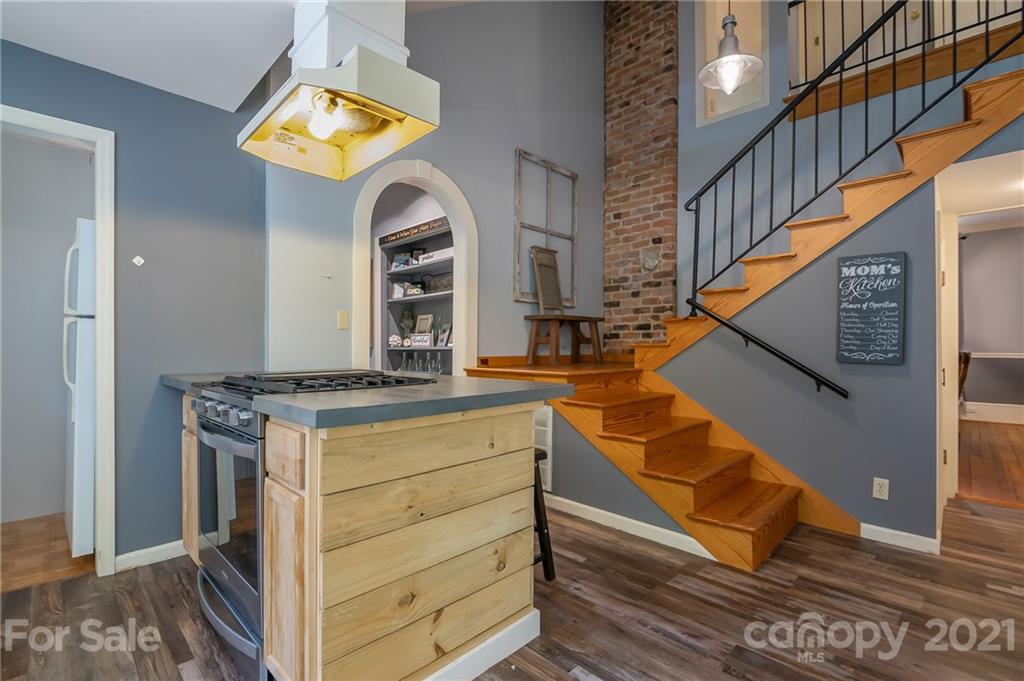 15 Doubleday Road Tryon, NC 28782 - Photo 22 of 46 a view of an entryway with wooden floor and staircase