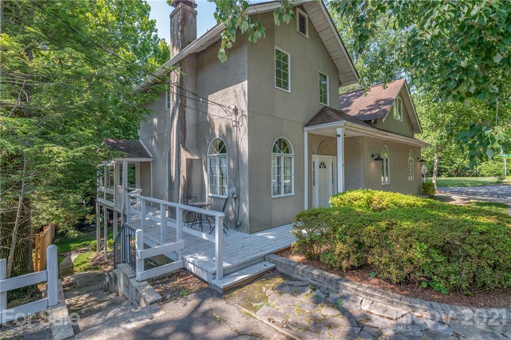 15 Doubleday Road Tryon, NC 28782 - Photo 36 of 46 a view of a house with a yard and large tree