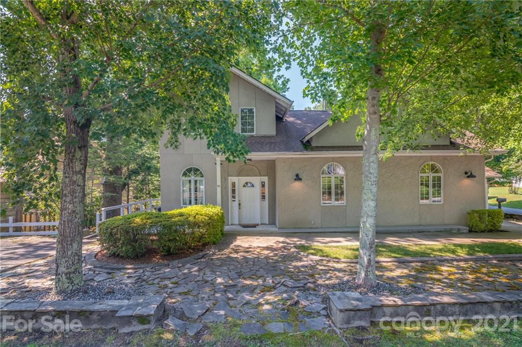 15 Doubleday Road Tryon, NC 28782 - Photo 38 of 46 a view of a house with backyard and garden