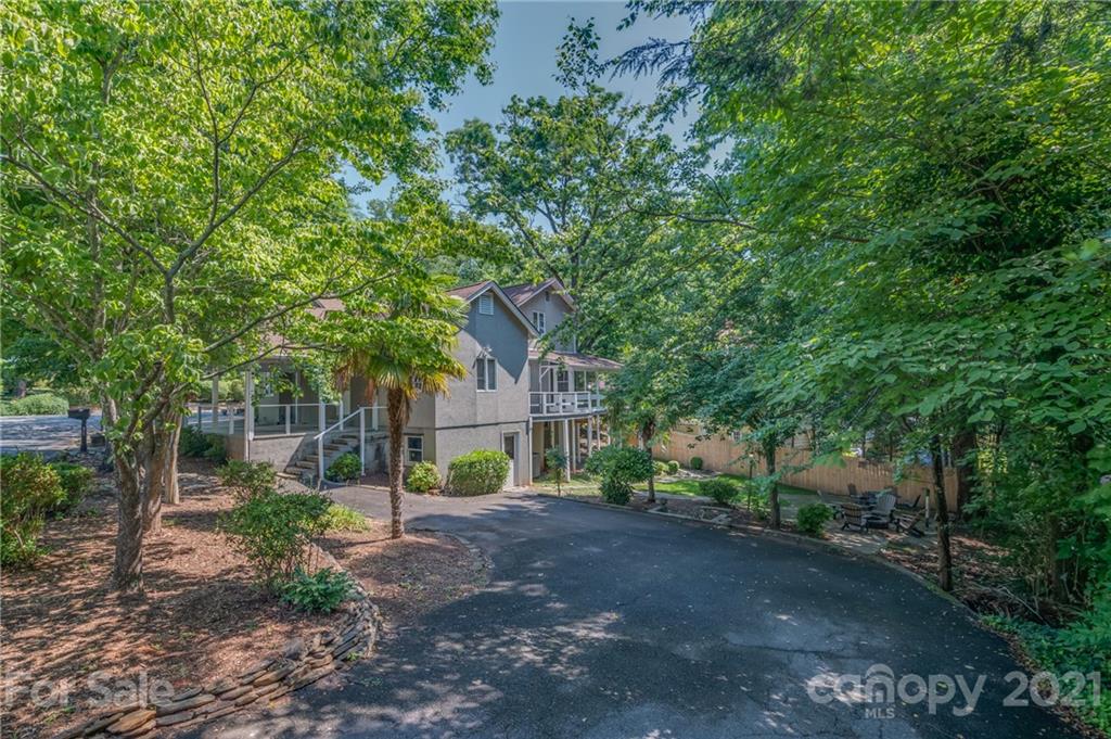 15 Doubleday Road Tryon, NC 28782 - Photo 6 of 46 a view of a house with a street