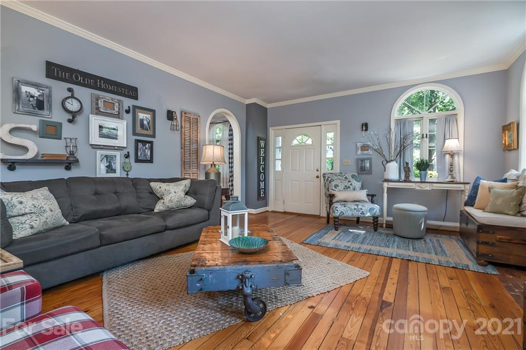 15 Doubleday Road Tryon, NC 28782 - Photo 8 of 46 a living room with furniture and a wooden floor