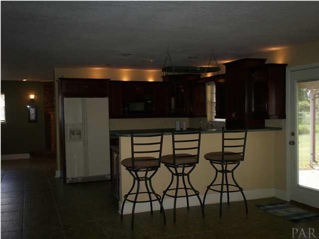 6925 Frank Reeder Road Pensacola, FL 32526 - Photo 11 of 13 Spacious Kitchen...everything is new...lots of recessing lighting...new appliances