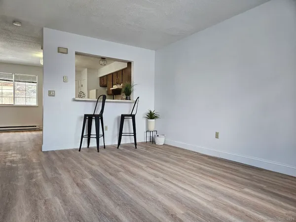 a view of a livingroom with a furniture