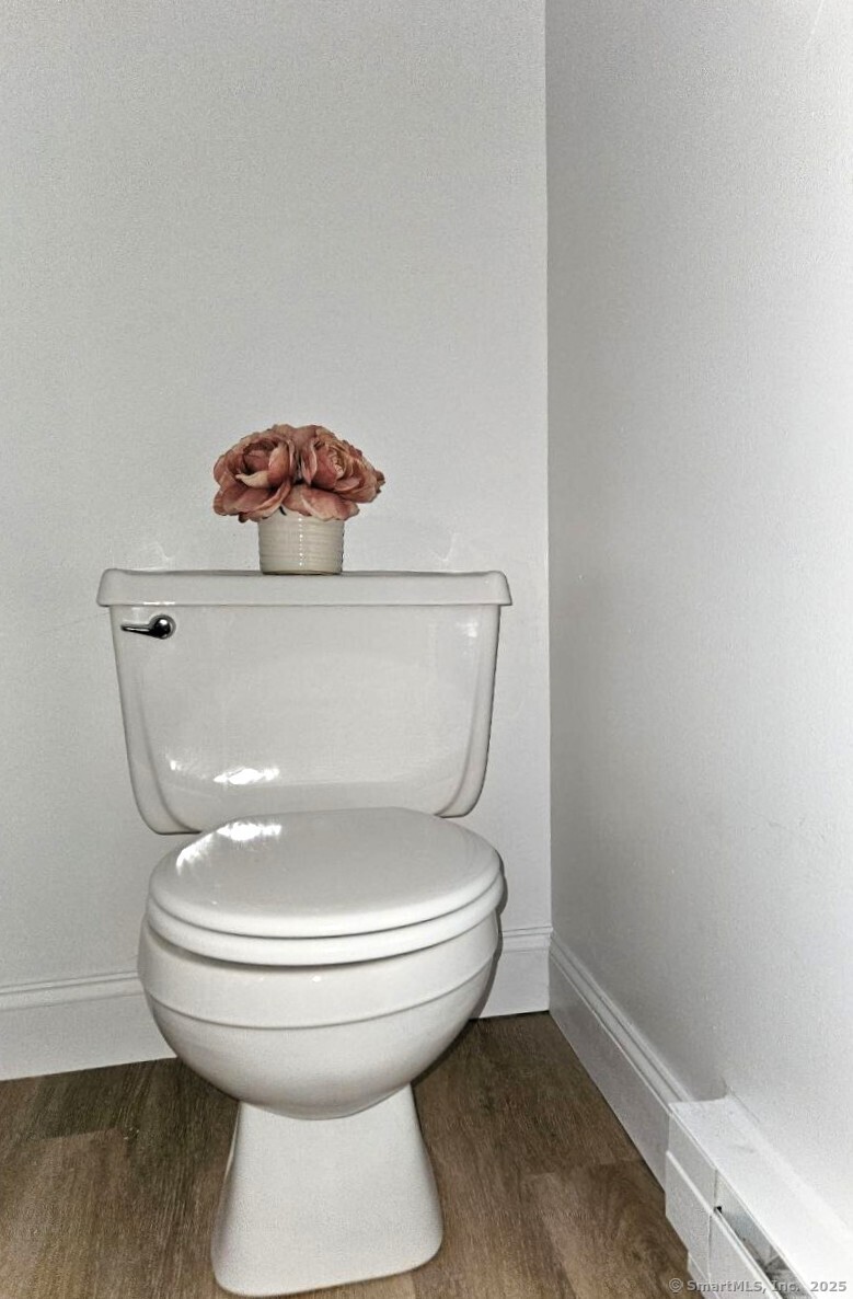 975 Meriden Road, Unit 11 Waterbury, CT 06705 - Photo 23 of 27 a close view of a toilet in a room