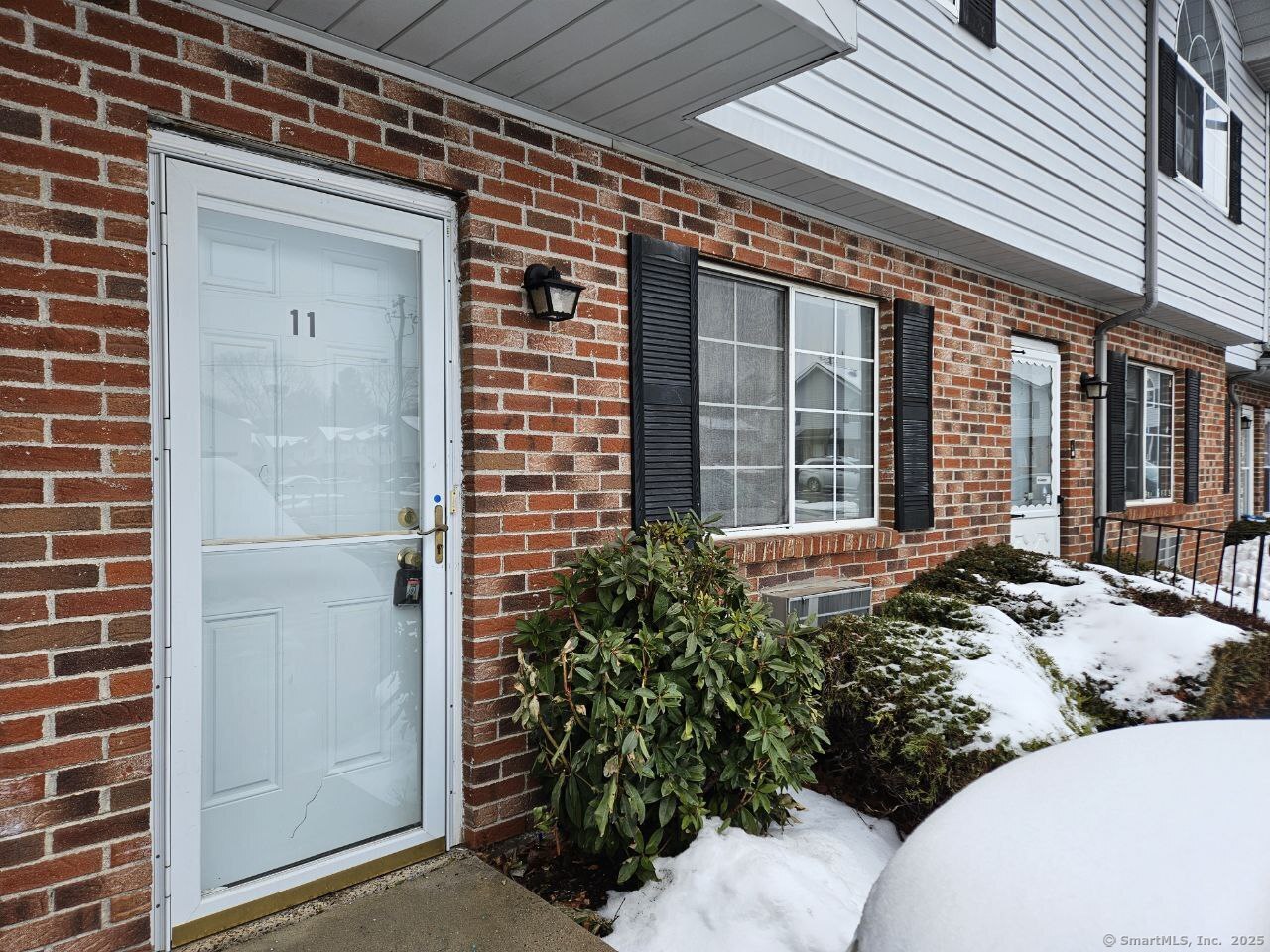 975 Meriden Road, Unit 11 Waterbury, CT 06705 - Photo 5 of 27 a view of house with outdoor space