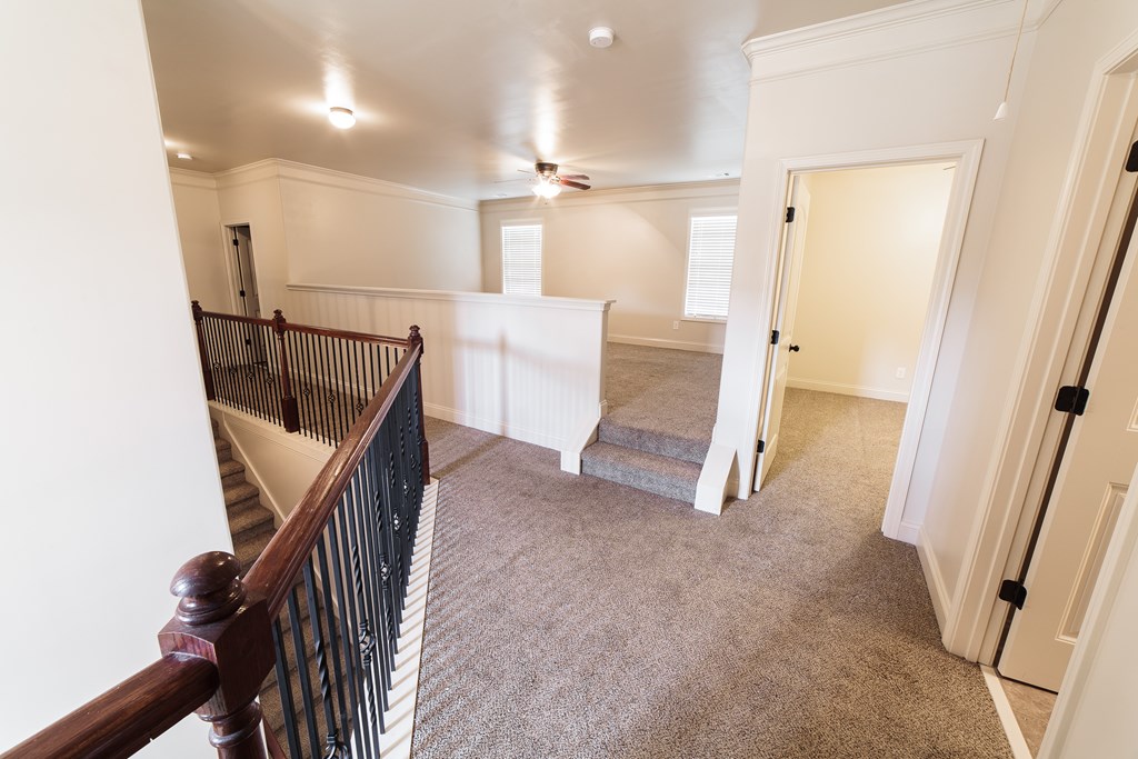 82 Riverside Landing Fort Mitchell, AL 36856 - Photo 40 of 47 a view of a hallway with entryway and stairs
