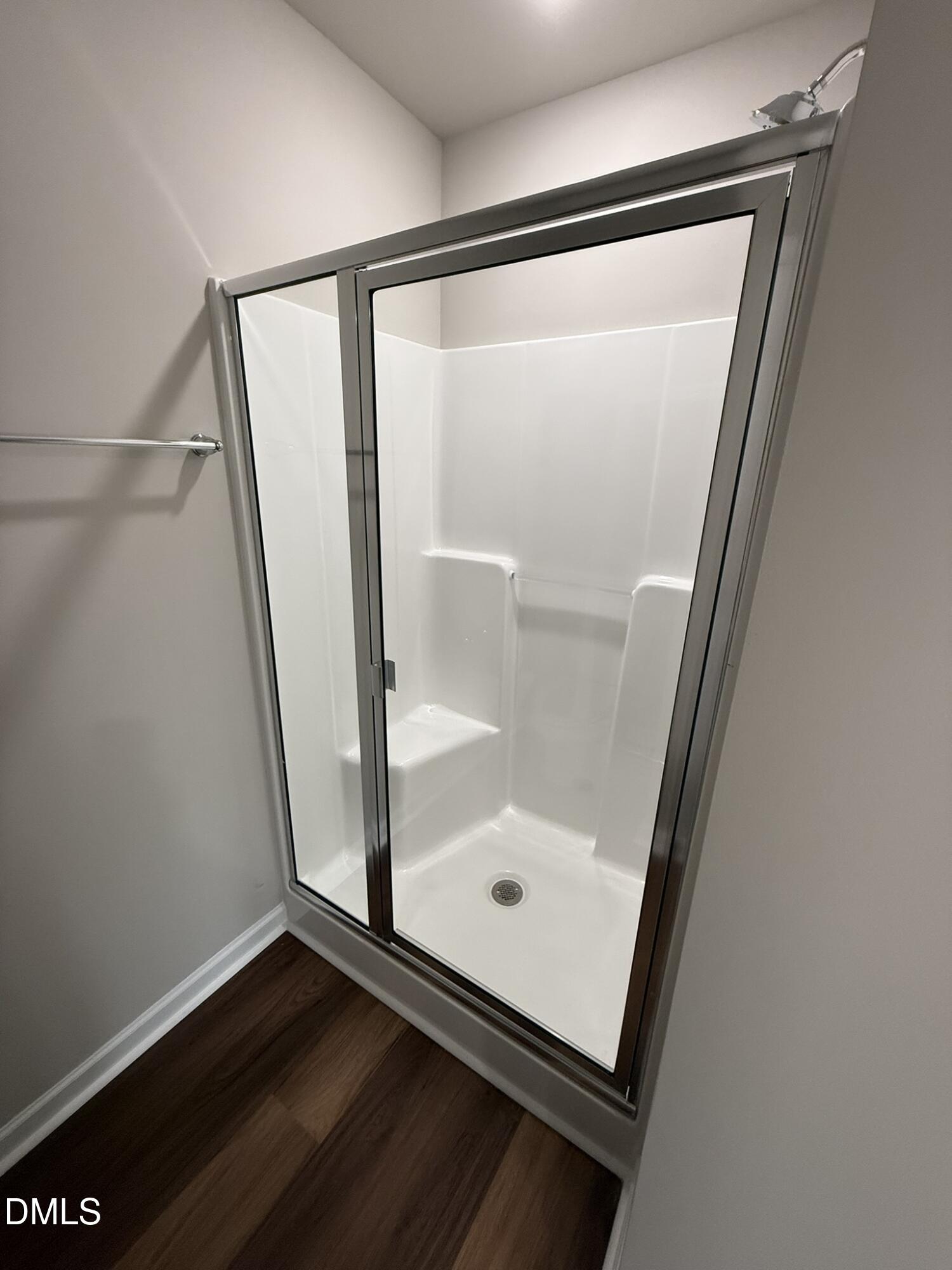 1853 Old Kenly Road Kenly, NC 27542 - Photo 17 of 22 a bathroom with a glass shower door