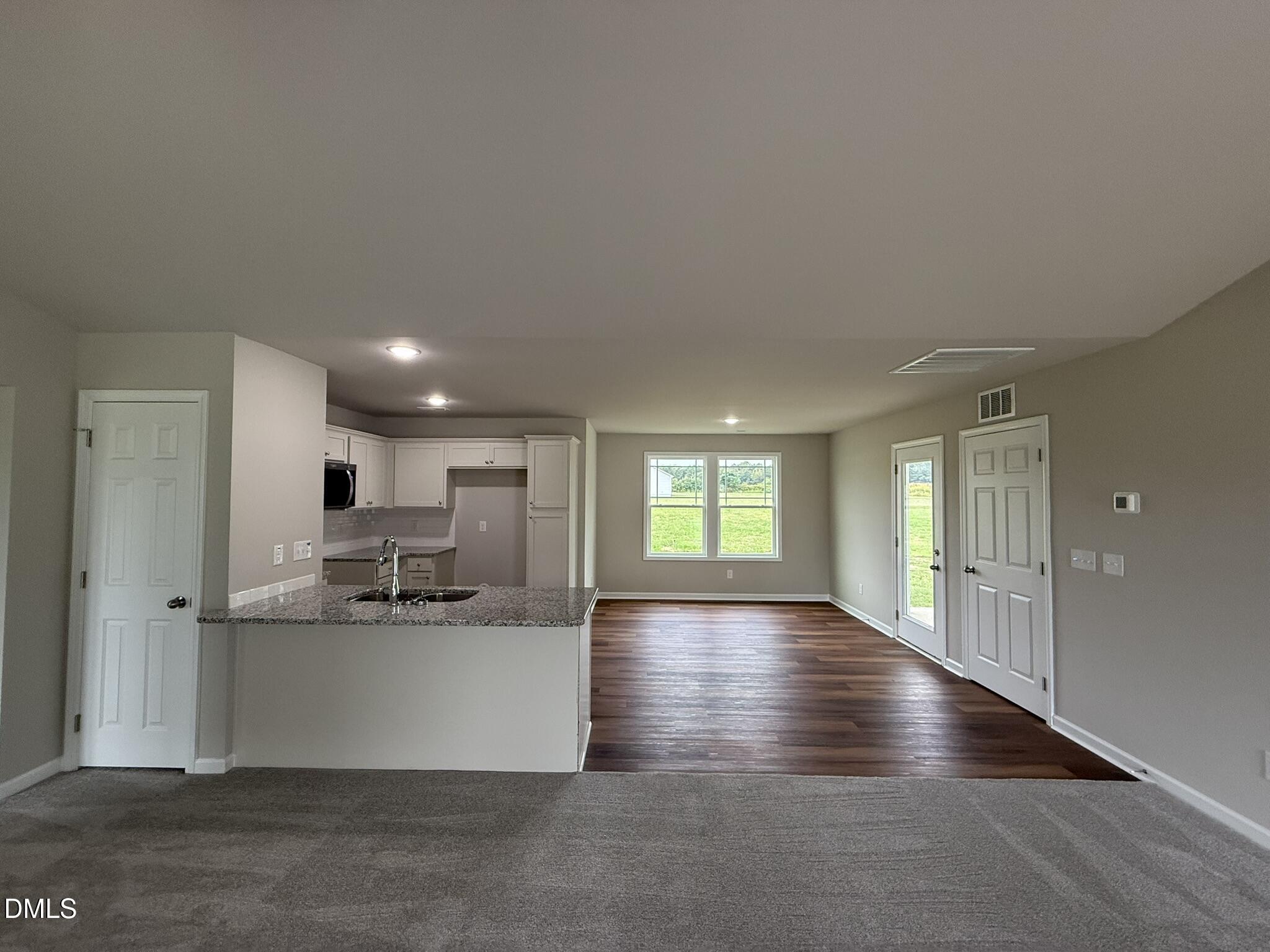 1853 Old Kenly Road Kenly, NC 27542 - Photo 8 of 22 a view of a kitchen with a sink and cabinets