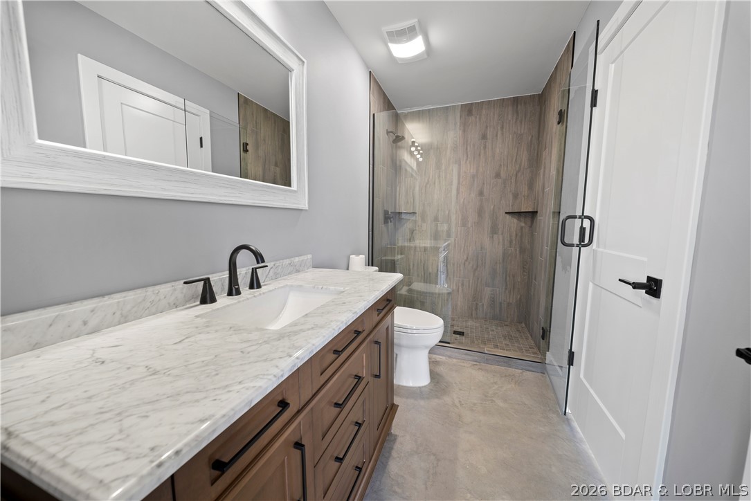 1356 Duckhead Road Lake Ozark, MO 65049 - Photo 63 of 99 Lower-Level Bathroom w/ Walk-In, Tiled Shower